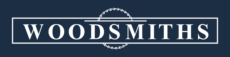 WOODSMITHS logo in white text on a dark blue background with a circular saw blade graphic above the text.